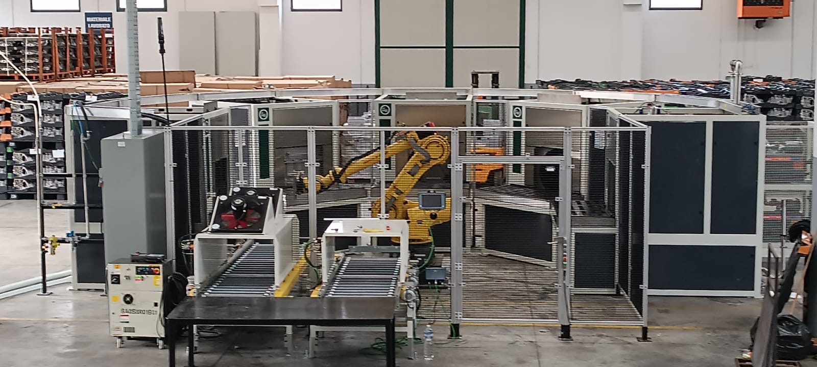 Impianto automatizzato d'impregnazione sottovuoto CAPI SYSTEM con braccio robotico FANUC