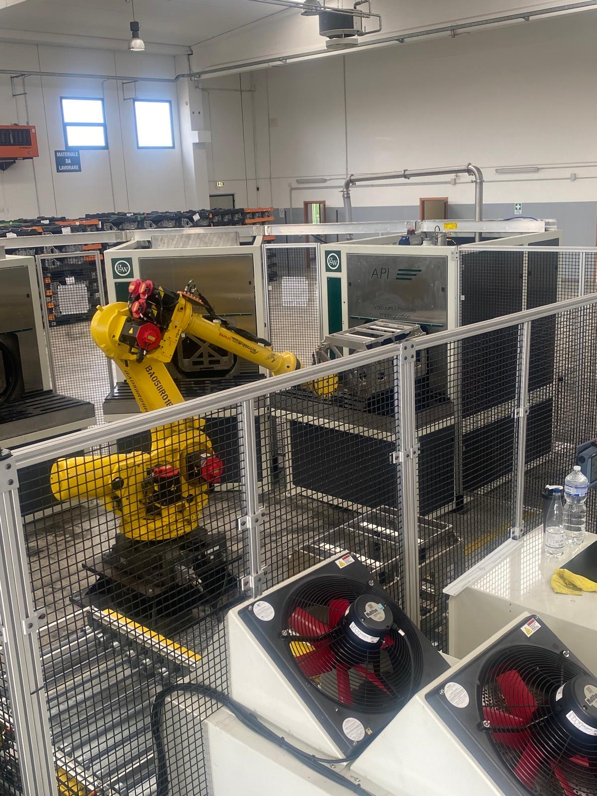 Sistema robotizzato CAPI per impregnazione sottovuoto di getti in alluminio